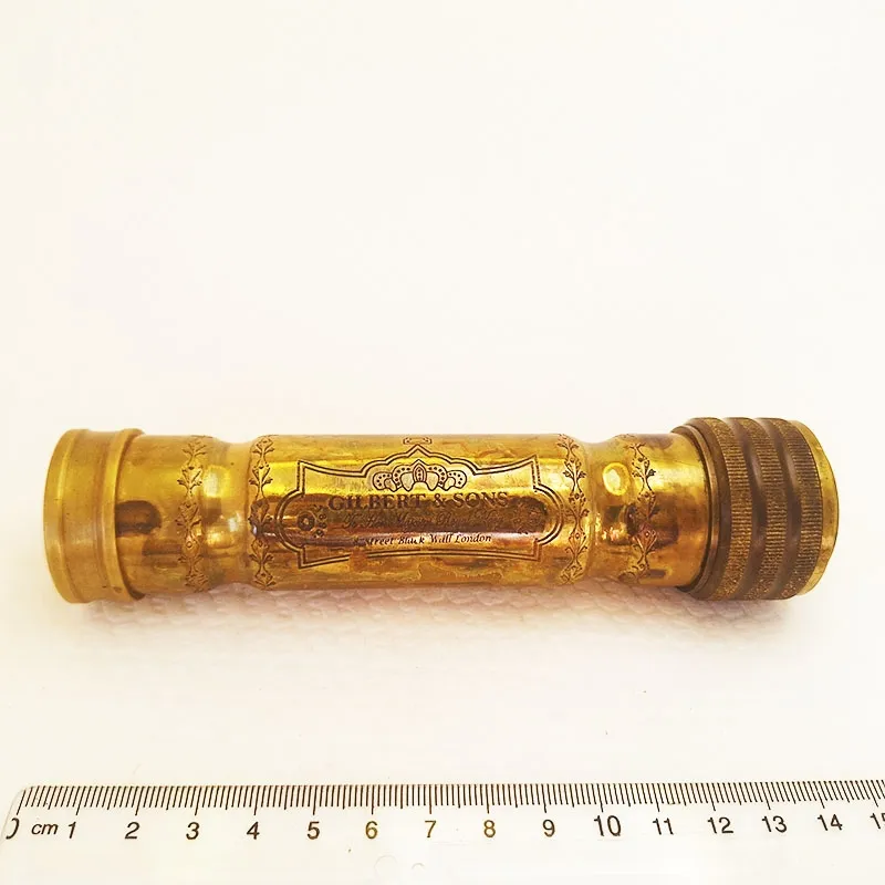 Bronze kaleidoscope in a wooden box