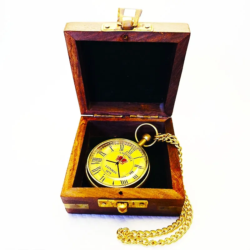 Bronze clock with retro design in a wooden box