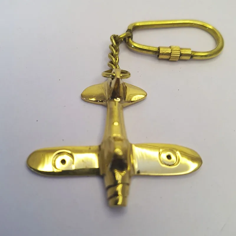 Bronze key ring with bronze airplane