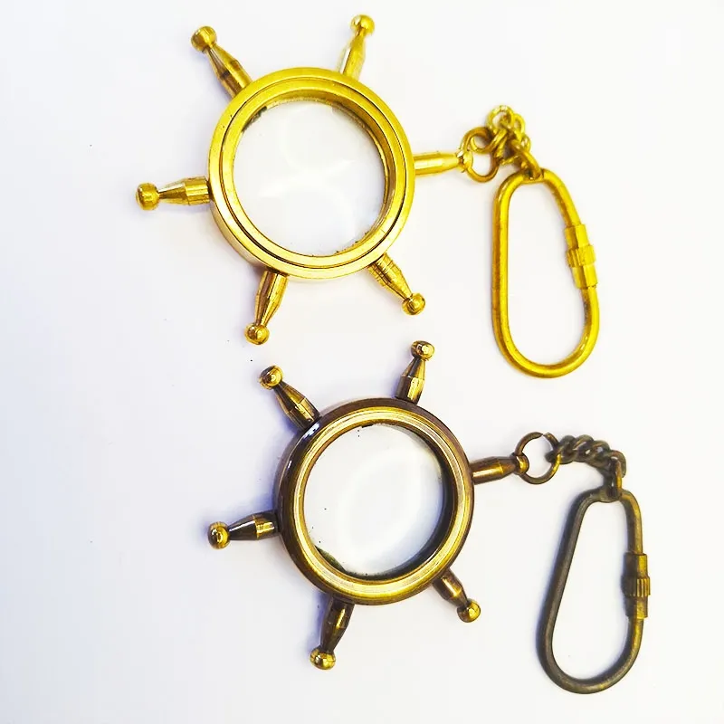 Bronze key chain with steering wheel, rudder and magnifying glass 2